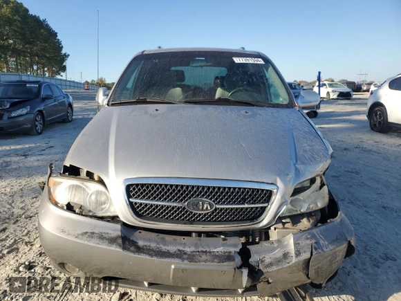 2004 Kia Sedona LX with VIN KNDUP131346508490, listed as a Copart auction lot 77391594 with 41,211 mi miles and Salvage Title. Bid and sale history available at carsss.com. Image 5.