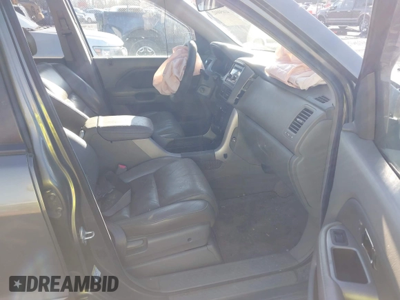 2006 Honda Pilot EX-L with VIN 5FNYF28546B002907, listed as a IAAI auction lot 41650042 with 272,069 mi miles and . Bid and sale history available at DreamBid. Image 5.