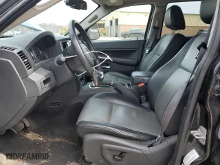 2009 Jeep Grand Cherokee Laredo with VIN 1J8GR48K79C537213, listed as a Copart auction lot 51222395 with 148,838 mi miles and Salvage Title. Bid and sale history available at carsss.com. Image 7.