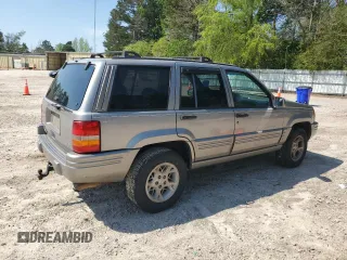 1998 Jeep Grand Cherokee Limited with VIN 1J4GZ78YXWC160346, listed as a Copart auction lot 52595655 with Not provided miles and Salvage title. Bid and sale history available at DreamBid. Image 3.