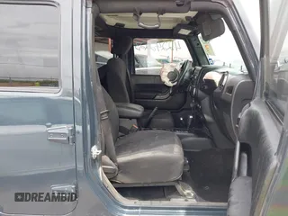 2017 Jeep Wrangler Unlimited Sport with VIN 1C4BJWDG2HL634291, listed as a IAAI auction lot 42242223 with 145,880 mi miles and . Bid and sale history available at DreamBid. Image 5.