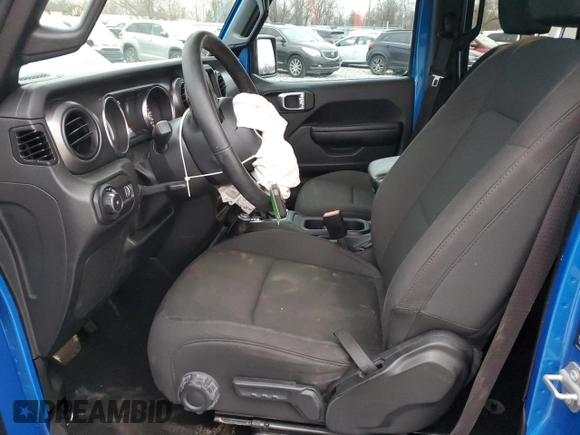 2023 Jeep Wrangler Sport S with VIN 1C4HJXDG9PW543144, listed as a Copart auction lot 43745495 with 36,989 mi miles and Salvage Title. Bid and sale history available at DreamBid. Image 7.