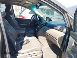 2012 Honda Odyssey EX-L with VIN 5FNRL5H65CB012428, listed as a IAAI auction lot 42164272 with 256,253 mi miles and . Bid and sale history available at carsss.com. Image 5.