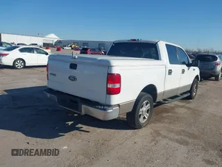 2005 Ford F-150 XLT with VIN 1FTPW12585FA54825, listed as a IAAI auction lot 41662210 with 288,819 mi miles. Bid and sale history available at carsss.com. Image 4.