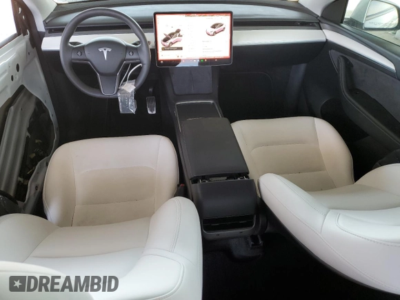 2023 Tesla Model Y Long Range with VIN 7SAYGDEE8PF620703, listed as a Copart auction lot 54655105 with 29,538 mi miles and Salvage Title. Bid and sale history available at DreamBid. Image 8.