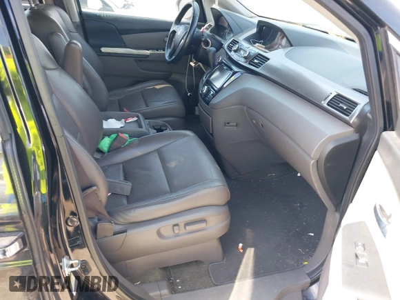 2015 Honda Odyssey EX-L with VIN 5FNRL5H68FB094983, listed as a IAAI auction lot 42031539 with 231,144 mi miles and . Bid and sale history available at DreamBid. Image 5.