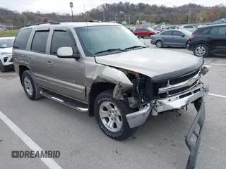 2003 Chevrolet Tahoe LT z VIN 1GNEK13Z53J148280, wystawiony jako IAAI lot #40963535 z przebiegiem 196 726 mil mil oraz . Historia ofert i sprzedaży dostępna na DreamBid. Obrazek 1.