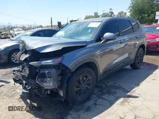 2019 Hyundai Santa Fe SE with VIN 5NMS23AD7KH009688, listed as a IAAI auction lot 41991686 with 77,942 mi miles and . Bid and sale history available at DreamBid. Image 18.