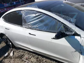 2023 Tesla Model 3 z VIN 5YJ3E1EA4PF482005, wystawiony jako IAAI lot #41363157 z przebiegiem 26 013 mil mil oraz . Historia ofert i sprzedaży dostępna na DreamBid. Obrazek 12.