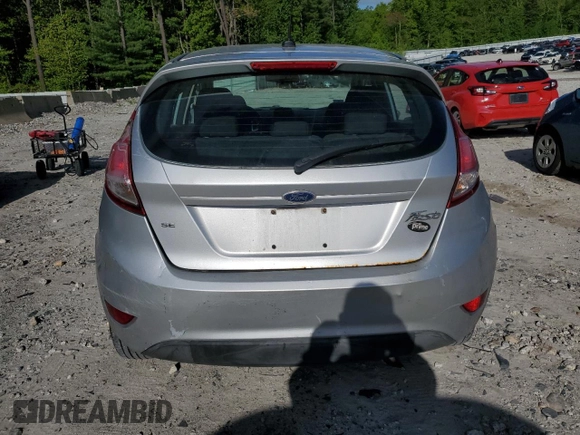 2015 Ford Fiesta SE z VIN 3FADP4EJ3FM115449, wystawiony jako Copart lot #57408015 z przebiegiem 175 083 mil mil oraz Czysty tytuł • Clean title. Historia ofert i sprzedaży dostępna na DreamBid. Obrazek 6.