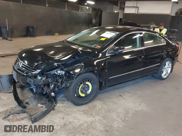 2015 Volkswagen CC R-Line with VIN WVWBP7AN8FE828106, listed as a IAAI auction lot 41867821 with 67,067 mi miles and . Bid and sale history available at DreamBid. Image 2.