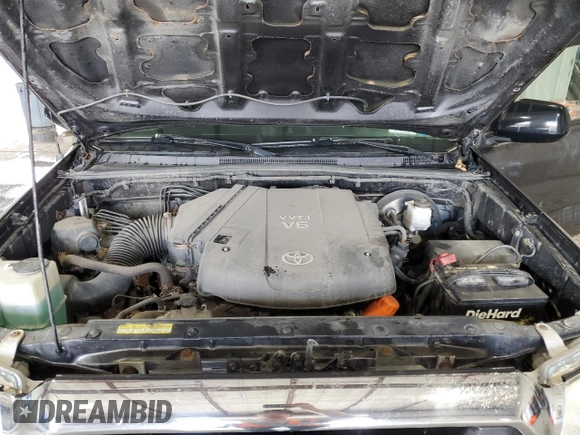 2013 Toyota Tacoma z VIN 3TMMU4FN7DM052275, wystawiony jako Copart lot #58338615 z przebiegiem 221 142 mil mil oraz Szkoda całkowita • Salvage title. Historia ofert i sprzedaży dostępna na DreamBid. Obrazek 11.
