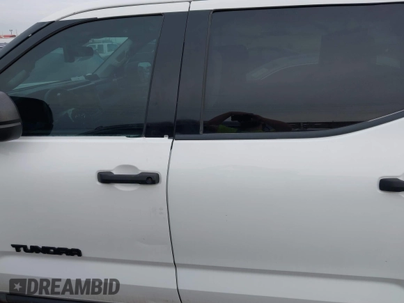 2023 Toyota Tundra SR5 with VIN 5TFLA5DB0PX077679, listed as a IAAI auction lot 42354545 with 31,838 mi miles and . Bid and sale history available at DreamBid. Image 14.