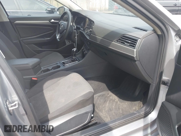 2021 Volkswagen Jetta S z VIN 3VWC57BUXMM048600, wystawiony jako IAAI lot #41956222 z przebiegiem 59 870 mil mil oraz . Historia ofert i sprzedaży dostępna na DreamBid. Obrazek 5.