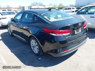 2016 Kia Optima LX with VIN 5XXGT4L3XGG013835, listed as a IAAI auction lot 41815349 with 120,628 mi miles. Bid and sale history available at carsss.com. Image 3.