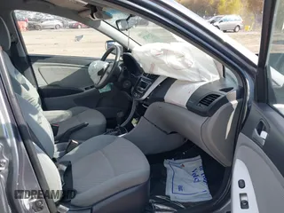2014 Hyundai Accent GLS with VIN KMHCT4AE9EU614191, listed as a IAAI auction lot 37899279 with 144,247 mi miles. Bid and sale history available at carsss.com. Image 5.
