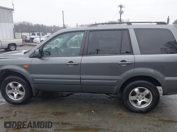 2007 Honda Pilot EX-L with VIN 5FNYF18677B033086, listed as a IAAI auction lot 41579680 with 280,246 mi miles and . Bid and sale history available at DreamBid. Image 14.