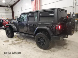 2022 Jeep Wrangler Unlimited Sport with VIN 1C4HJXDG4NW206622, listed as a Copart auction lot 87664525 with 62,240 mi miles and Salvage Title. Bid and sale history available at DreamBid. Image 2.