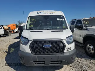 2021 Ford Transit with VIN 1FDAX2CG2MKA23709, listed as a Copart auction lot 74054214 with 105,503 mi miles and Salvage Title. Bid and sale history available at DreamBid. Image 5.