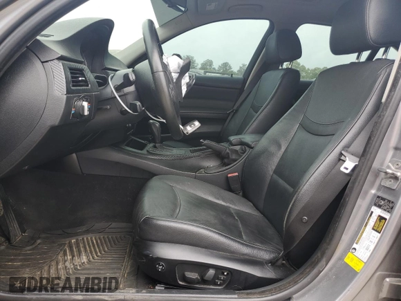 2010 BMW 3 Series 328i xDrive with VIN WBAPK5C54AA648639, listed as a Copart auction lot 53168945 with 174,513 mi miles and Salvage title. Bid and sale history available at DreamBid. Image 7.