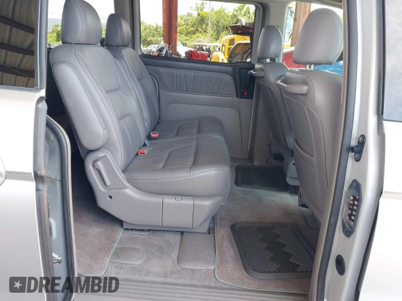 2003 Honda Odyssey EX-L z VIN 5FNRL18933B087714, wystawiony jako IAAI lot #42510813 z przebiegiem 145 360 mil mil oraz . Historia ofert i sprzedaży dostępna na DreamBid. Obrazek 8.