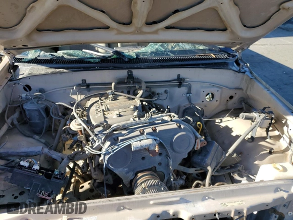 1993 Toyota T100 z VIN JT4VD20C5P0005978, wystawiony jako Copart lot #80282574 z przebiegiem Nie podano mil oraz Szkoda całkowita • Salvage title. Historia ofert i sprzedaży dostępna na DreamBid. Obrazek 11.