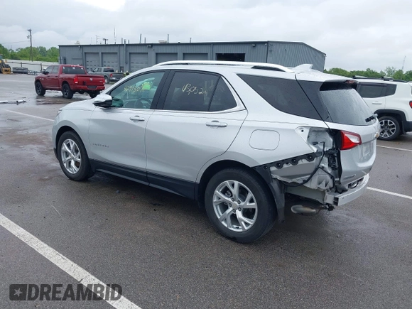 2021 Chevrolet Equinox Premier with VIN 3GNAXNEV4MS153066, listed as a IAAI auction lot 42413071 with 43,052 mi miles and . Bid and sale history available at DreamBid. Image 3.