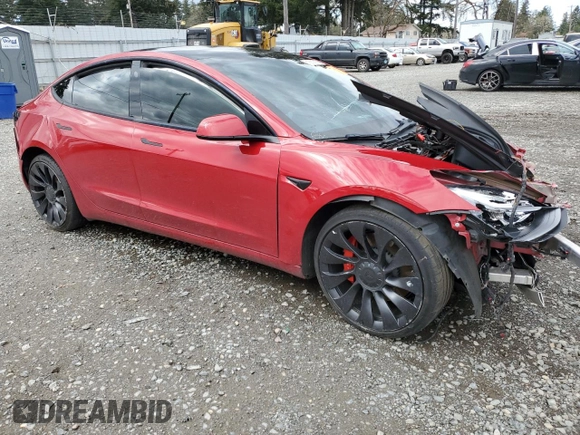 2022 Tesla Model 3 Performance with VIN 5YJ3E1EC6NF244817, listed as a Copart auction lot 51681565 with Not Provided miles and Salvage Title. Bid and sale history available at DreamBid. Image 4.