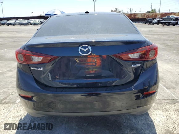 2015 Mazda 3 i Grand Touring with VIN 3MZBM1W7XFM135576, listed as a Copart auction lot 54060755 with 137,374 mi miles and Salvage title. Bid and sale history available at DreamBid. Image 6.