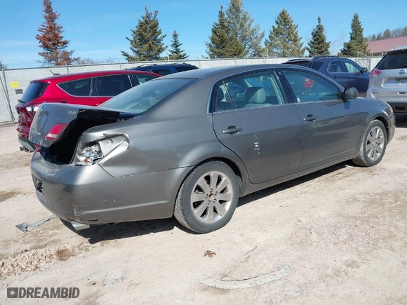 2005 Toyota Avalon XL with VIN 4T1BK36B65U027633, listed as a IAAI auction lot 41769335 with 89,904 mi miles. Bid and sale history available at carsss.com. Image 4.