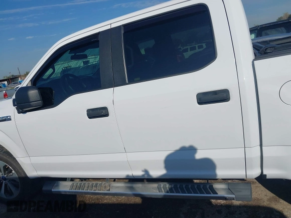 2019 Ford F-150 XL with VIN 1FTEW1CPXKKF00869, listed as a IAAI auction lot 41197442 with 77,487 mi miles and . Bid and sale history available at DreamBid. Image 14.