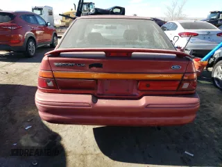 1996 Ford Escort z VIN 1FASP11J0TW138176, wystawiony jako Copart lot #82435494 z przebiegiem 62 107 mil mil oraz Czysty tytuł • Clean title. Historia ofert i sprzedaży dostępna na DreamBid. Obrazek 6.