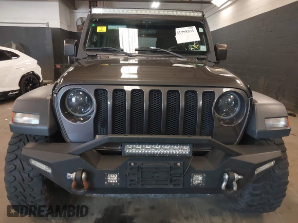 2018 Jeep Wrangler Unlimited Sport S с VIN 1C4HJXDG7JW280918, выставлен на аукционе IAAI как лот 41998831 с пробегом 66 539 миль миль и . История ставок и продаж доступна на DreamBid. Изображение 12.