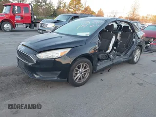 2017 Ford Focus SE with VIN 1FADP3FE7HL298287, listed as a IAAI auction lot 41870698 with Not Provided miles and . Bid and sale history available at carsss.com. Image 16.