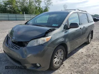 2011 Toyota Sienna XLE AAS with VIN 5TDYK3DC0BS100800, listed as a Copart auction lot 63927145 with 260,272 mi miles and Clean title. Bid and sale history available at DreamBid. Image 1.