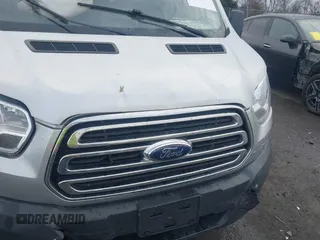 2017 Ford Transit with VIN 1FTBW2CM9HKB42073, listed as a IAAI auction lot 41187596 with 100,287 mi miles and . Bid and sale history available at DreamBid. Image 6.
