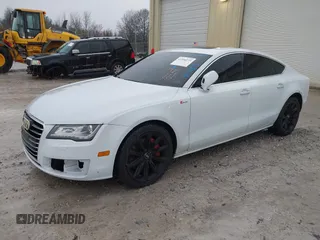 2014 Audi A7 Premium Plus z VIN WAUWGAFC0EN083417, wystawiony jako IAAI lot #41350273 z przebiegiem 163 402 mil mil oraz . Historia ofert i sprzedaży dostępna na DreamBid. Obrazek 17.