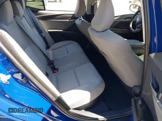 2025 Toyota Camry LE with VIN 4T1DAACK3SU104152, listed as a IAAI auction lot 42039337 with 1,423 mi miles and . Bid and sale history available at DreamBid. Image 8.