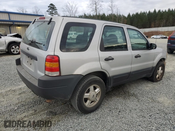 2004 Ford Escape with VIN 1FMCU02144KB63439, listed as a Copart auction lot 85310514 with 275,625 mi miles and Salvage title. Bid and sale history available at DreamBid. Image 3.