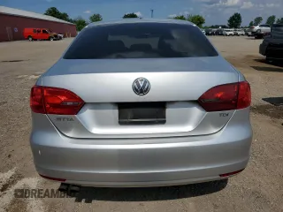 2012 Volkswagen Jetta Comfortline with VIN 3VWDL7AJ0CM375068, listed as a Copart auction lot 57349685 with 370,214 mi miles and Salvage title. Bid and sale history available at DreamBid. Image 6.