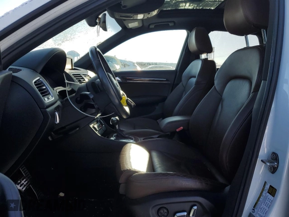 2018 Audi Q3 Premium with VIN WA1BCCFS0JR014031, listed as a Copart auction lot 87606595 with 52,690 mi miles and Salvage title. Bid and sale history available at DreamBid. Image 7.