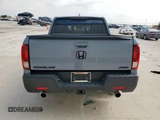 2023 Honda Ridgeline RTL-E with VIN 5FPYK3F76PB036572, listed as a Copart auction lot 54717085 with 34,516 mi miles and Salvage title. Bid and sale history available at DreamBid. Image 6.