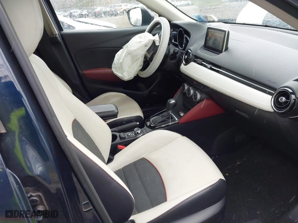 2017 Mazda CX-3 Grand Touring with VIN JM1DKFD75H0179167, listed as a IAAI auction lot 41980243 with 69,076 mi miles. Bid and sale history available at carsss.com. Image 5.