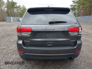 2021 Jeep Grand Cherokee Laredo X with VIN 1C4RJFAG6MC703691, listed as a IAAI auction lot 41655340 with 53,300 mi miles and . Bid and sale history available at DreamBid. Image 16.
