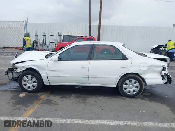 2001 Toyota Camry CE with VIN JT2BG22K110603452, listed as a IAAI auction lot 41731258 with 117,142 mi miles. Bid and sale history available at carsss.com. Image 14.