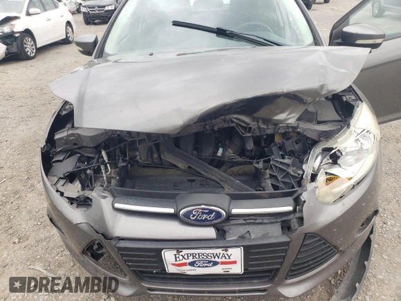 2013 Ford Focus SE with VIN 1FADP3F21DL320932, listed as a Copart auction lot 55031435 with 133,444 mi miles and Salvage title. Bid and sale history available at DreamBid. Image 12.