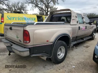 1999 Ford F-350 XL z VIN 1FTWW32F1XEA00890, wystawiony jako Copart lot #81316284 z przebiegiem 221 920 mil mil oraz Nie do naprawy • Non repairable. Historia ofert i sprzedaży dostępna na DreamBid. Obrazek 3.