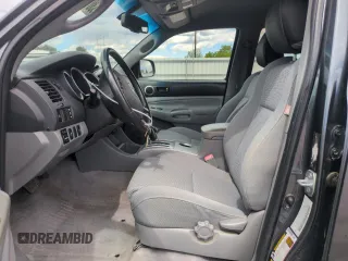 2009 Toyota Tacoma with VIN 3TMLU42N39M024000, listed as a Copart auction lot 55301375 with 210,068 mi miles and Salvage Title. Bid and sale history available at DreamBid. Image 7.
