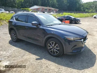2018 Mazda CX-5 Grand Touring with VIN JM3KFBDM8J0342272, listed as a Copart auction lot 61930115 with 119,727 mi miles and Salvage title. Bid and sale history available at DreamBid. Image 4.
