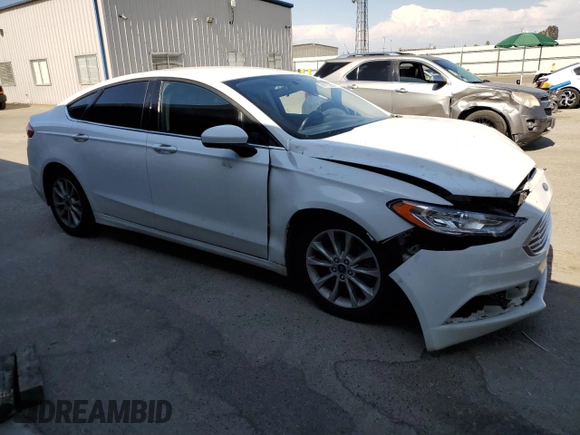 2017 Ford Fusion Hybrid SE with VIN 3FA6P0LU8HR381067, listed as a Copart auction lot 60173255 with 76,046 mi miles and Salvage title. Bid and sale history available at DreamBid. Image 4.